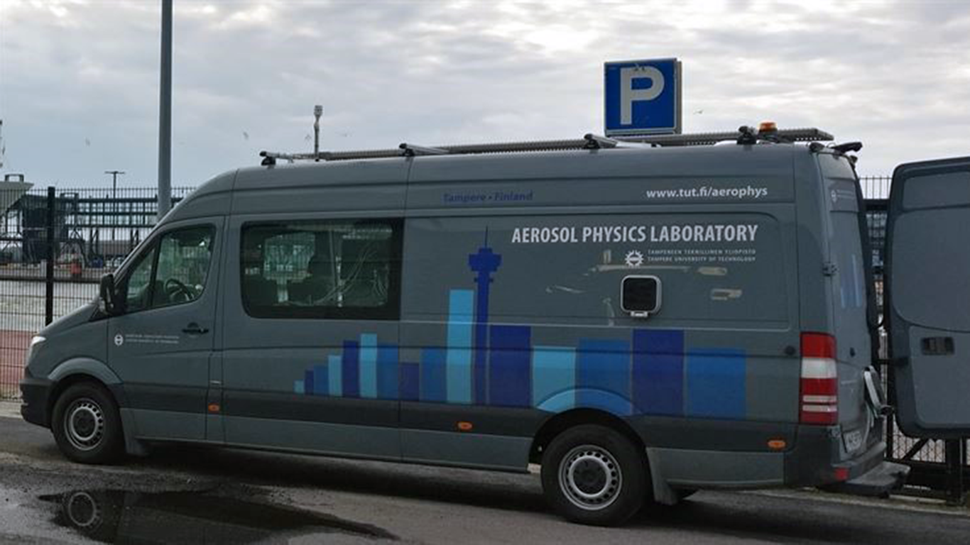 Picture of the Aerosol Phycics Laboratory vehicle of the University of Tampere during a measurement camgaign in Helsinki