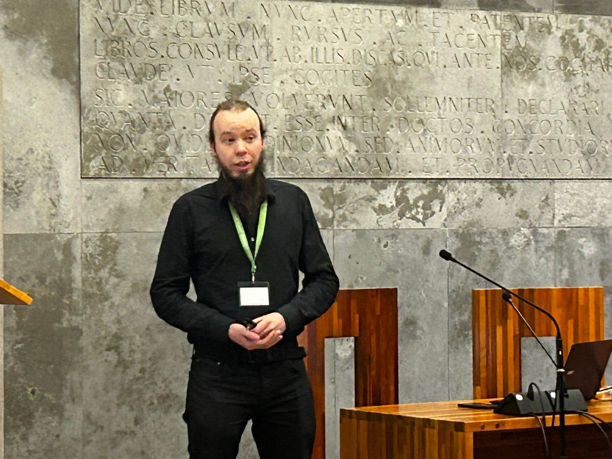 Student presenting - man standing, speaking